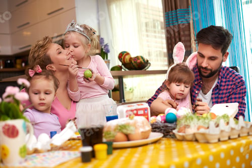 Preview: Parents and three girls before the Easter