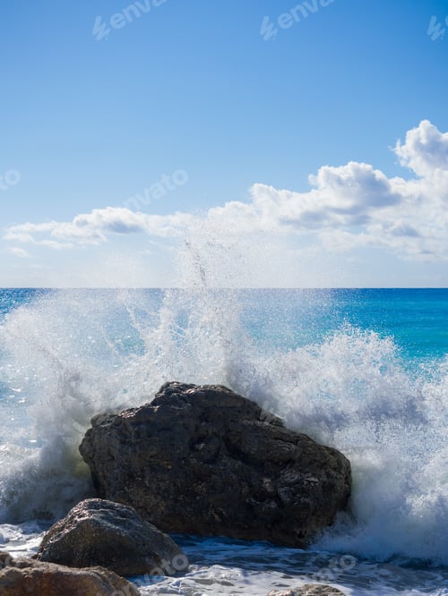 Preview: waves breaking on a stony beach