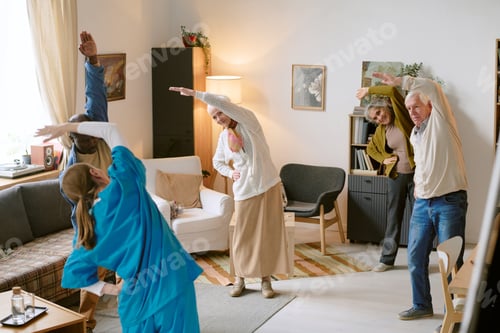 Preview: Unrecognizable Nurse Doing Exercises with Pensioners