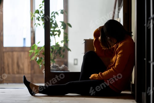 Preview: Anxious and depressed Asian woman