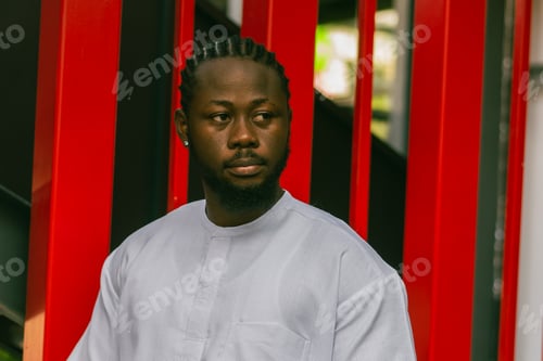 Preview: Cheerful male tourist portrait dress in white wear dashiki ethnic smiling at city street or small