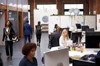 Preview: Business Team Working At Desks In Modern Open Plan Office