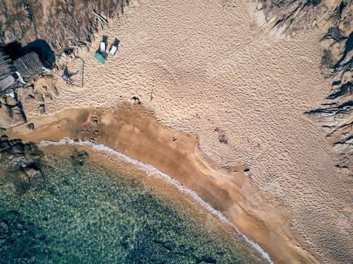 Preview: Man In Hammock On A Beautiful Beach Aerial View Drone Shot, Sithonia, Greece