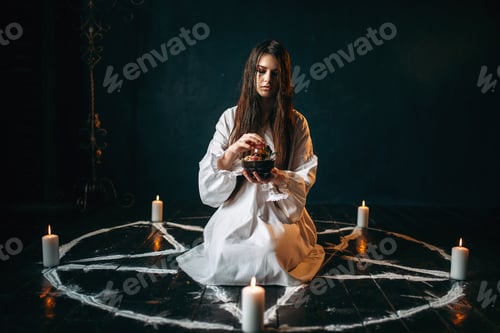 Preview: Woman produces a ritual of black magic, occultism