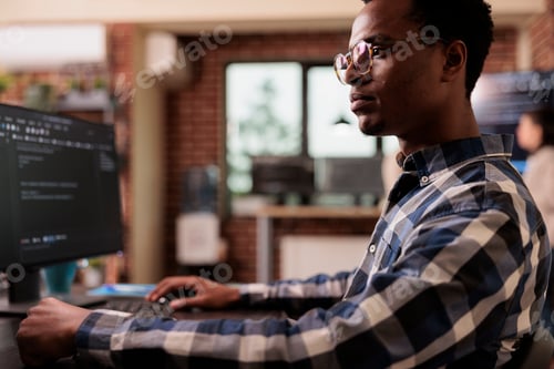 Preview: Software developers working with html script on terminal window