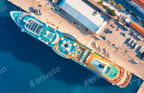 Preview: Aerial view of swimming pool, sunbeds, umbrellas on cruise ship