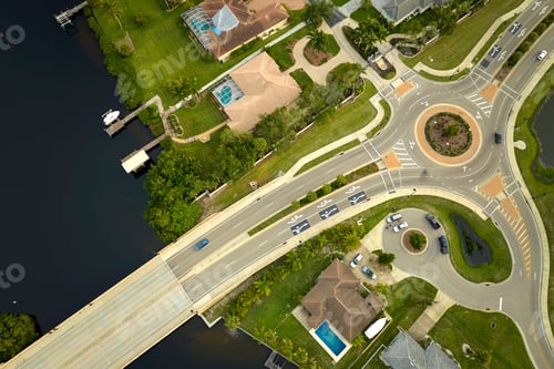 Preview: Aerial view of american suburban area with rural road roundabout intersection