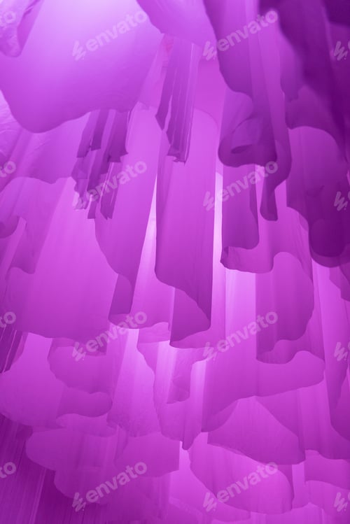 Preview: Vertical shot of a purple hanging billowy fabric creating dreamy enchanting texture - wallpaper