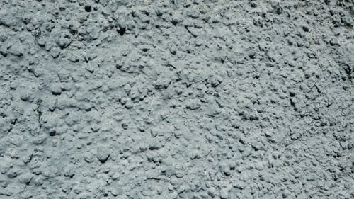 Preview: High detailed abstract gray drip wall background. Closed up of gray stone