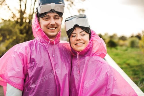 Preview: Closeup shot of a male and a female smiling while having taken the VR headset off