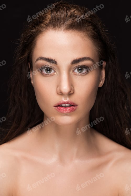 Preview: portrait of attractive young woman with brunette hair, isolated on black