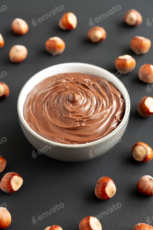 Preview: Delicious Homemade Chocolate Hazelnut Spread in a Bowl, side view.