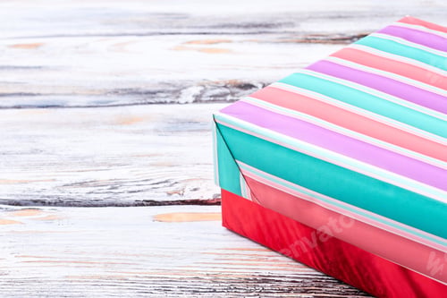 Preview: Multicolored striped gift box, cropped image