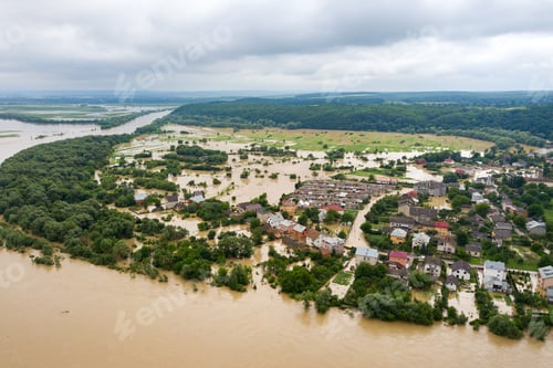 Preview: Aerial view of flooded houses with dirty water of Dnister river in Halych town, western Ukraine