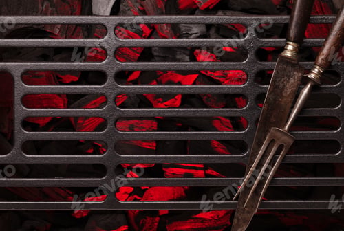Preview: Metal barbecue grill over hot coal