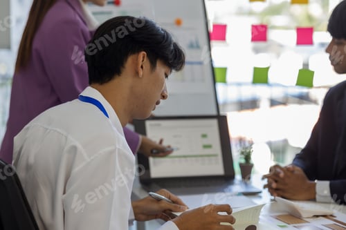 Preview: entrepreneurs brainstorm together to develop new products in a conference room