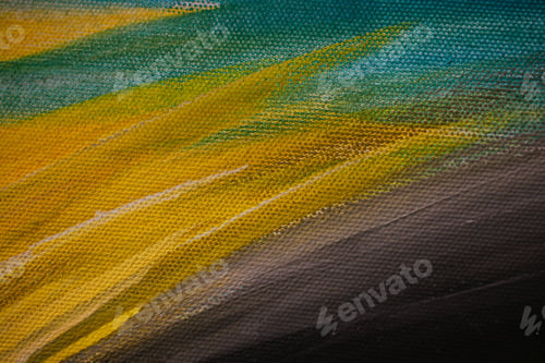 Preview: Closeup of an abstract multicolour painting on canvas under the lights