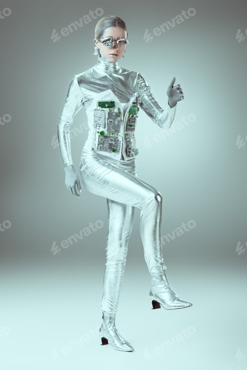 Preview: full length view of silver cyborg walking on grey, future technology concept