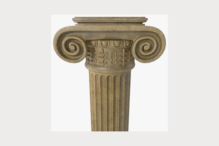 Preview: Carved stone column with floral and spiral motifs
