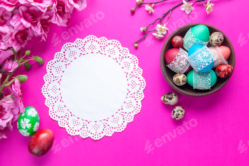 Preview: top view colored eggs on pink background concept spring ethnic ornate novruz colourful