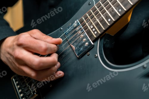 Preview: rock performer with electric guitar recording studio creating song musical instrument strings