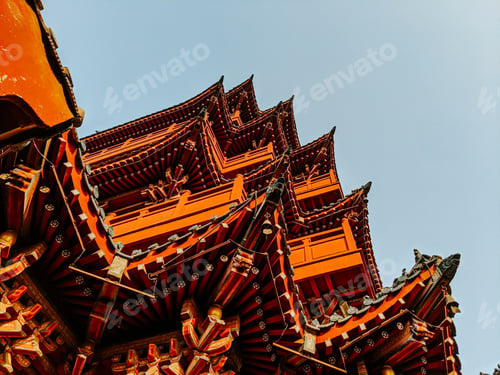 Preview: Low angle shot of the building under the sunlight and a blue sky in Millennium City Park, Kaifeng
