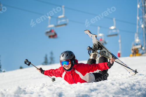 Preview: Woman skier with ski at winer resort in sunny day