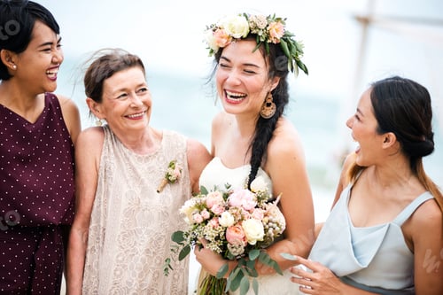 Preview: Cheerful bride at the beach