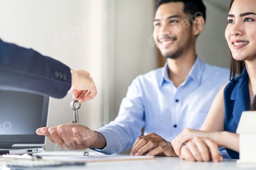 Preview: Young Asian couple makes contract with house sale agency.