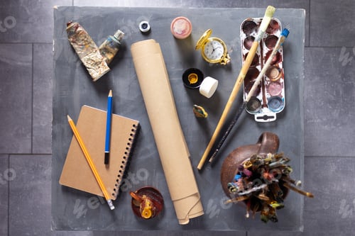 Preview: Paintbrush and tubes with painter tools at abstract table background texture. Art painter concept