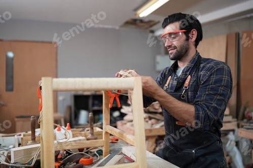 Preview: Carpenters Assembling Furniture