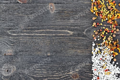 Preview: Frame from salt and spices on black wooden board