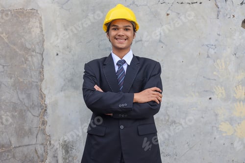 Preview: Portrait of confident Asian male engineer smiling