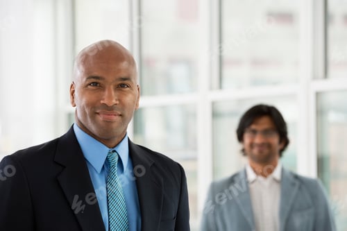 Preview: A business environment, a light airy city office. Business people. Two men in suits.