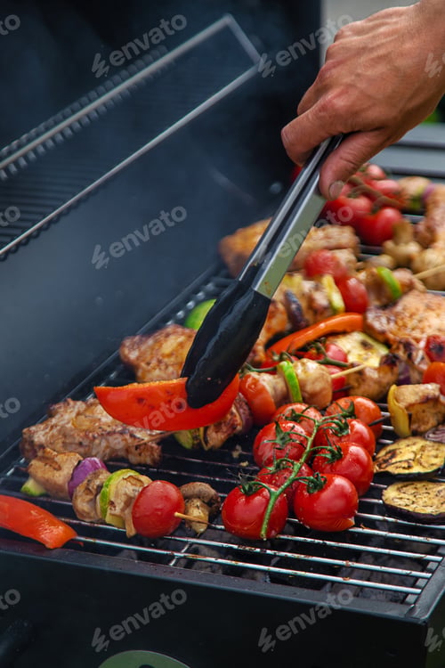 Preview: Vegetables and meat are grilled. Selective focus.