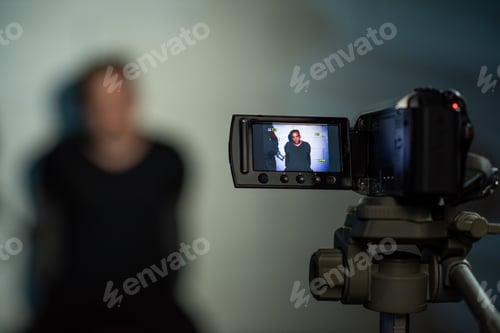 Preview: Young criminal giving confession about crime for camera