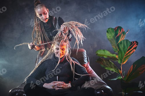 Preview: Talented master is making dreadlocks for a girl