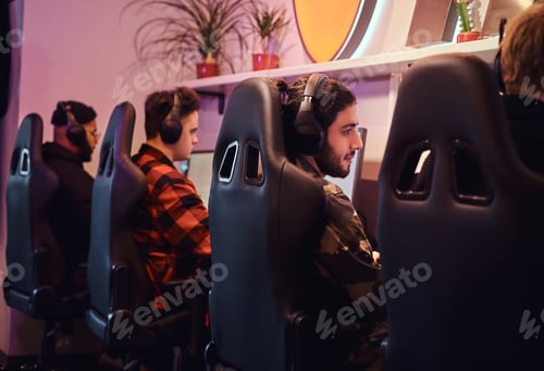 Men Wearing Headsets at Gaming Tournament or Office