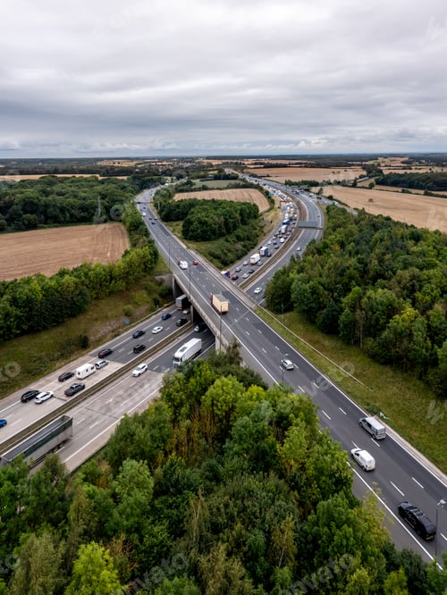 Preview: Aerial vertical landscape of traffic jam on the M1 motorway