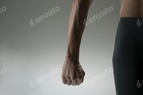 Preview: Athlete's clenched fist showing determination and strength