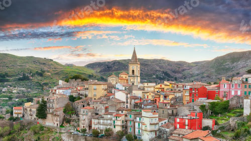 Preview: Amazing Panorama of the belltower and the village in the valley at sunset