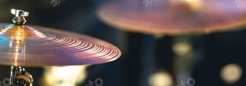 Preview: Part of a drum kit in the dark with beautiful lighting.