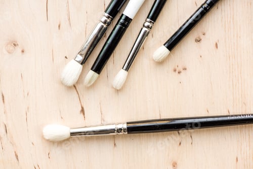Preview: Assorted make up brushes, top view.