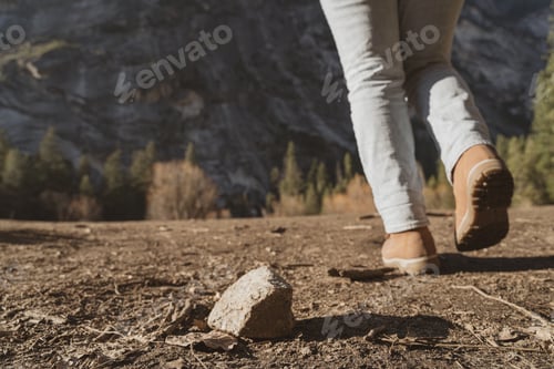 Preview: Woman Hiking in nature closeup of hiking boot in nature