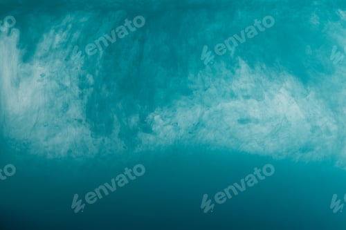 Preview: Close up view of turquoise paint swirls in water