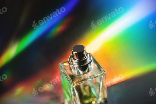 Preview: Close-Up of Glass Perfume Bottle with Rainbow Reflections