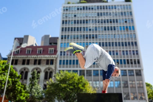Preview: Man doing parkour in the city on a sunny day