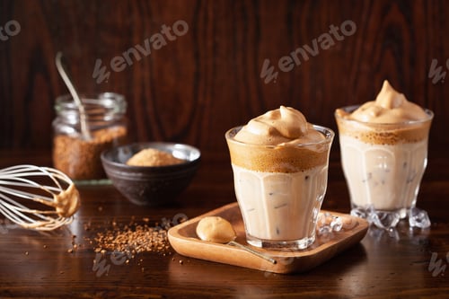 Preview: dalgona coffee in glass. trendy Instant coffee whipped with sugar and hot water