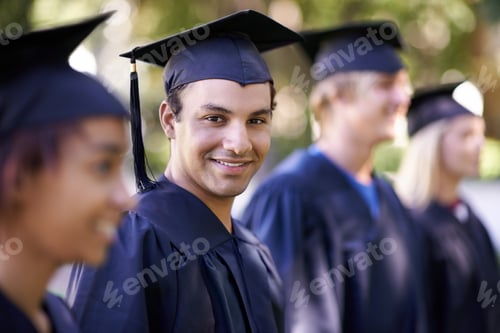 Preview: Ready for my future. A group of smiling graduates standing in a row.