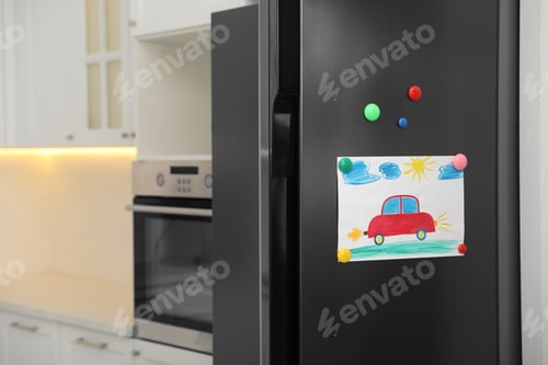 Preview: Child's Drawing Pinned to a Refrigerator Door